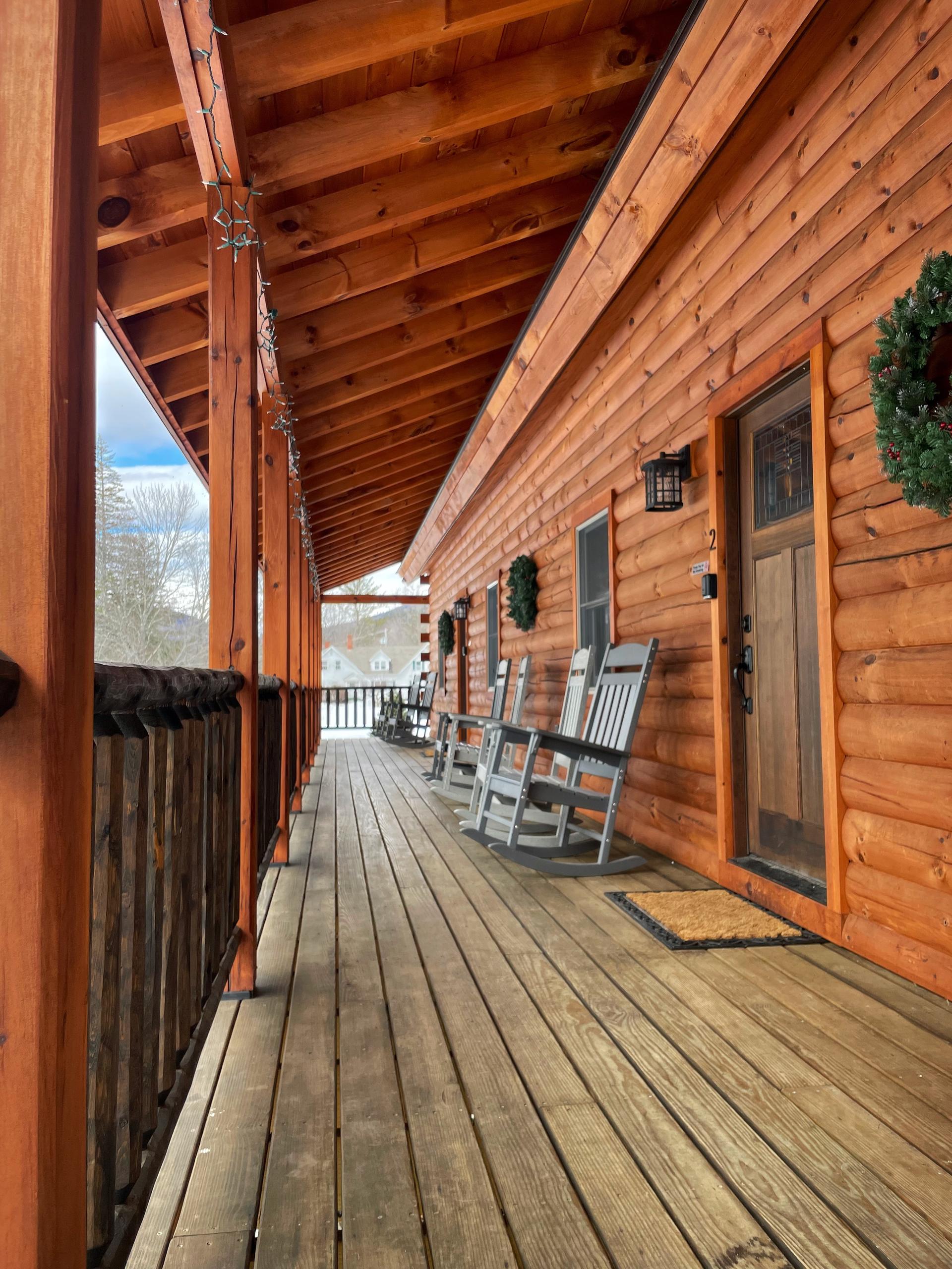 View of deck with rocking chairs